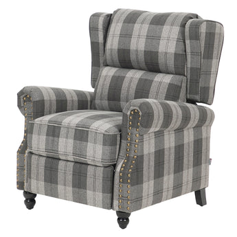 Pushback recliner chair with gray plaid upholstery, padded arms and studded trim