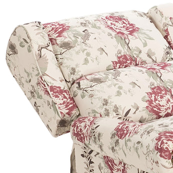 Floral recliner chair arm and backrest close-up, cream fabric with red rose pattern
