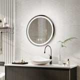 Round LED bathroom mirror with illuminated edge light above white sink