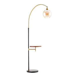 Arc floor lamp with round glass globe shade and wood tray shelf, black pole, gold frame