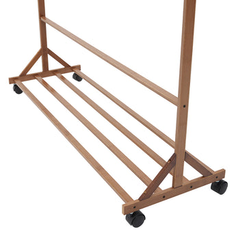 Close-up of slatted base and caster wheels on bamboo clothes coat rack