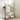 Bamboo garment rack with hanging bar, side pegs, hat holder, and wheels