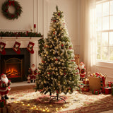 Artificial Christmas tree with warm lights and red accents, supported by metal stand.