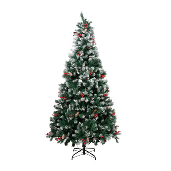 Artificial Christmas tree with lit branches and red ornaments on metal stand base.