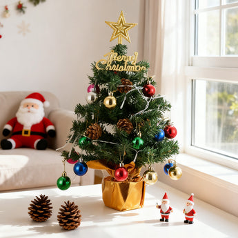 Tabletop Christmas tree decoration in a gold cup pot with gold star topper, LED lights, ornaments