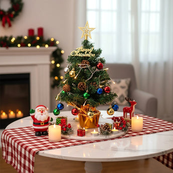 Tabletop Christmas tree decoration with gold star topper, red and blue baubles, LED string lights
