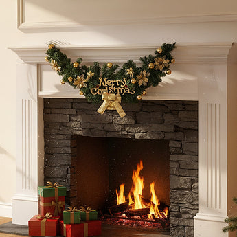 Christmas garland swag with green foliage, gold ornaments, and Merry Christmas centerpiece