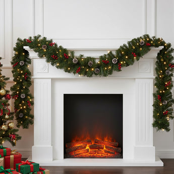 Artificial Christmas wreath with green pine garland, red baubles, and warm LED light string
