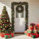Artificial Christmas wreath with green foliage, red and gold ornaments, and warm LED lights