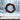 Artificial Christmas garland wreath with green pine, red poinsettias, and red baubles