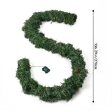 Artificial Christmas garland wreath with warm LED lights, green tinsel-style