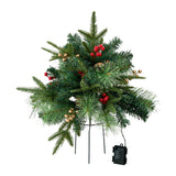 Artificial Christmas tree urn filler with green branches, red berries, gold accents and string lights