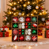 Boxed Christmas tree ornaments set with red, green, and white baubles and star snowflakes.