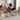 Home nursery rocking chair with tufted backrest, gray seat and black/beige contrast panels