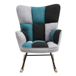 Upholstered rocking lounge chair with high back, gray seat with teal, white, and black blocks