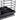 Black steel kitchen sink caddy with layered wire racks and lower slotted tray