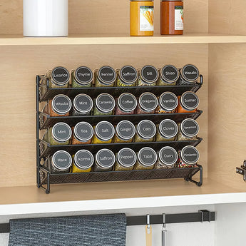 4-tier metal spice rack with spice jars in round labels, black wire shelves