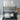 Black 2-tier dish drainer rack with utensil slots and plate-drying tier