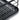 Black metal dish drainer base tray with slotted draining grid and support bars