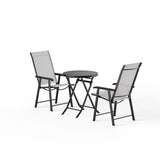 Outdoor patio chair set with dark metal frames, gray mesh backs and armrests