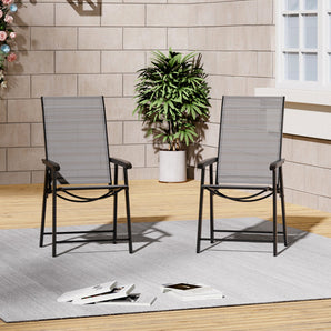 Outdoor patio chair set with dark frames, gray mesh backs, and curved armrest supports