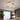 Adjustable semi-recessed LED ceiling fixture with four glowing square rings, white frame