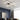 Adjustable semi-recessed LED ceiling fixture with four square rings and soft white glow