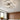 Adjustable semi-recessed LED ceiling fixture with four glowing square rings, white finish