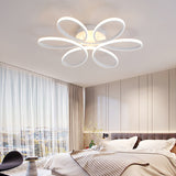 Five-petal modern LED semi-ceiling luminaire with white ring lights, softly glowing