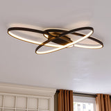 90cm LED ceiling light with black cross-ring frame and warm white glow