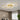 Gold 5-ring LED ceiling light with five staggered circular loops on a flush mount