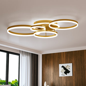 Gold 5-ring LED ceiling light with five circular loop frames and white inner glow