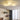 Star and moon LED ceiling fixture with illuminated stars and a curved crescent design.