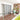 Silver stainless slope-and-stair handrail, floor-mounted top rail with bars