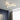 V-shaped LED semi-flush mount ceiling light with warm white LED glow and five blades