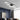 Modern LED ceiling light with black cross-shaped frame and rectangular LED strips