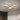 Golden LED semi-flush ceiling light with five circular ring arms and bright white glow
