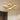 Golden acrylic LED semi-flush mount ceiling light with five white-lit ring shades