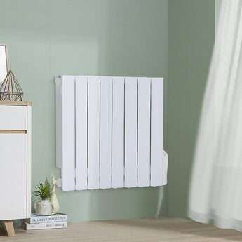 Wall-mounted white electric radiator heater with slim vertical fins on a wall
