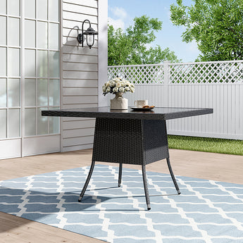 Black square outdoor table with center parasol hole and textured woven frame