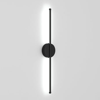 Black linear LED wall sconce with round backplate and vertical light bar, bright white