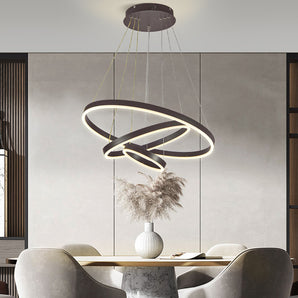 Black ring-shaped LED pendant light with circular glowing bands and hanging cords