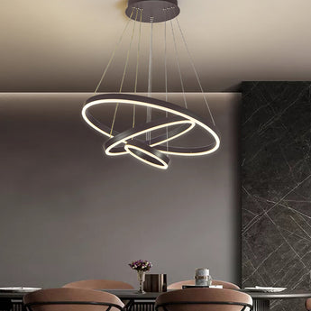 Black LED ring pendant light with two glowing circular rings and hanging cords