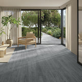 Grey rustic PVC wood plank flooring, long planks in a room setting