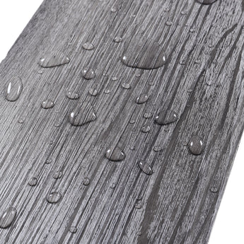 Dark grey woodgrain surface with water droplets for moisture resistance, PVC