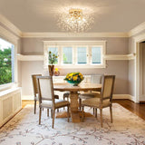 Gold Sputnik flush mount ceiling light with starburst crystal-like strands