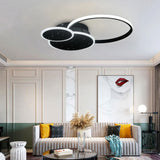 Modern LED flush mount ceiling light with circular rings and starry black glass discs