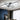 Modern geometric black LED ceiling light with rectangular white panels and frame