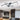 Black framed LED ceiling light with overlapping rectangular light sections