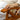 Bamboo recliner armrest detail with hand on wood slat surface